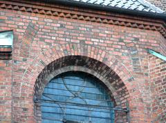 Detailed quire wall window of Helligåndskirken church in Copenhagen with traces of older larger windows
