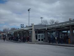 Entrance to Montreal Metro Henri Bourassa station with prominent signage and urban surroundings