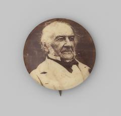 Vintage photobutton featuring a portrait of William Ewart Gladstone, historical politician and party leader