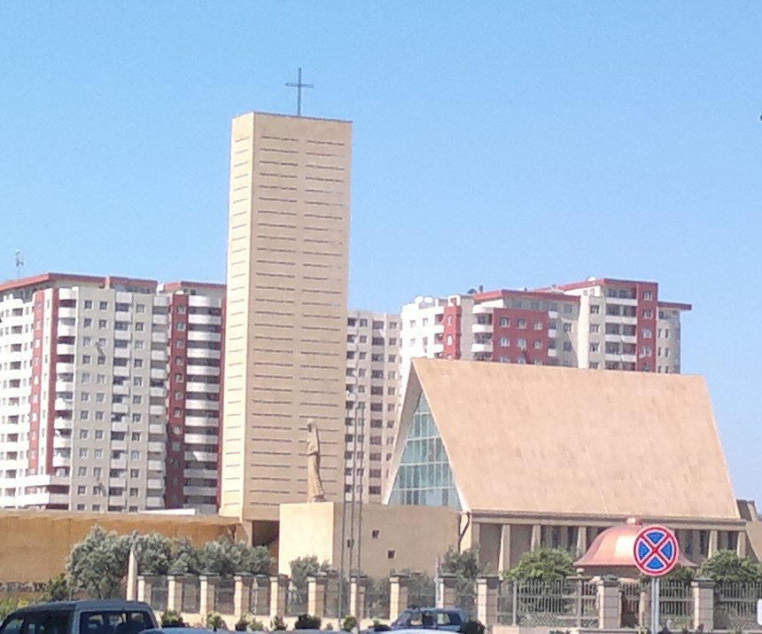 Exterior view of Church of the Immaculate Conception in Baku with blue sky