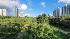 Scenic view of Yeouido Saetgang Ecological Park with lush greenery and water bodies in Seoul