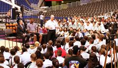 San Antonio Spurs' Head Coach Gregg Popovich talks with Junior ROTC cadets at Alamo Dome