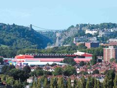 Aerial view of Ashton Gate Stadium and Clifton Suspension Bridge in Bristol