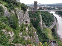 View of Avon Gorge and Clifton Suspension Bridge towards Bristol with Giant's Cave and grass-roofed tunnel