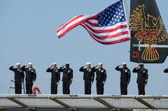U.S. Sailors and Marines manning the rails of USS Arlington during commissioning ceremony at Naval Station Norfolk