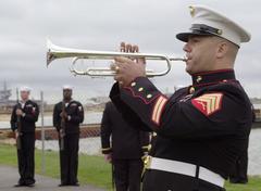 U.S. Marine Corps Sgt. Daniel Hersey playing trumpet during USS Cole 5th anniversary memorial ceremony in Norfolk