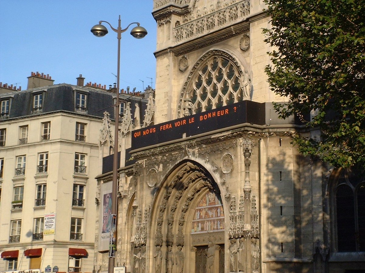 Church message board in Paris displaying information in 2005