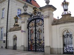 Historic city gate in Warsaw under clear blue sky