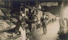 Historical image of Bonsecours Market around 1900 with Raoul Massé's Canadian tobacco booth