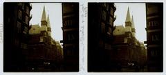 Black and white stereoscopic photograph of the Saint-Leu-Saint-Gilles Church at the corner of Rue Saint-Denis and Rue du Cygne in Paris, 1927