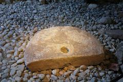 Medieval millstone from Helgeandsholmen in Stockholm