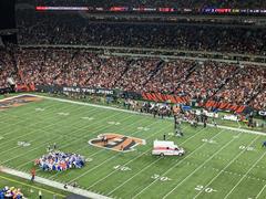 Buffalo Bills Safety Damar Hamlin being taken in ambulance from Paycor Stadium with teammates kneeling