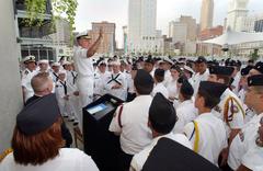 Admiral Vern Clark answering questions from Navy Reservists and NJROTC cadets at Paul Brown Stadium plaza Cincinnati Ohio