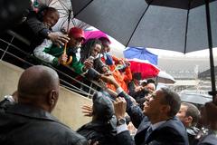 Barack Obama greeting South Africans at Soccer City during Nelson Mandela memorial service