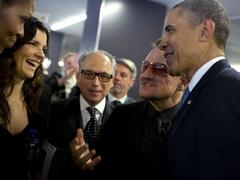 Bono and Ali Hewson greeting President and Mrs. Obama at Nelson Mandela memorial service