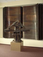 Sculptural composition dedicated to Martynas Mažvydas made of bronze by Kazys Kisielius