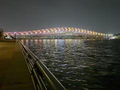 Sabarmati riverfront and Atal Pedestrian Bridge illuminated with colorful lights at night