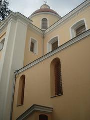Facade of the Orthodox Church of the Holy Spirit in Vilnius with golden domes and detailed architecture