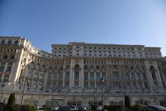 Panoramic view of Bucharest cityscape with urban buildings and clear sky in April 2018