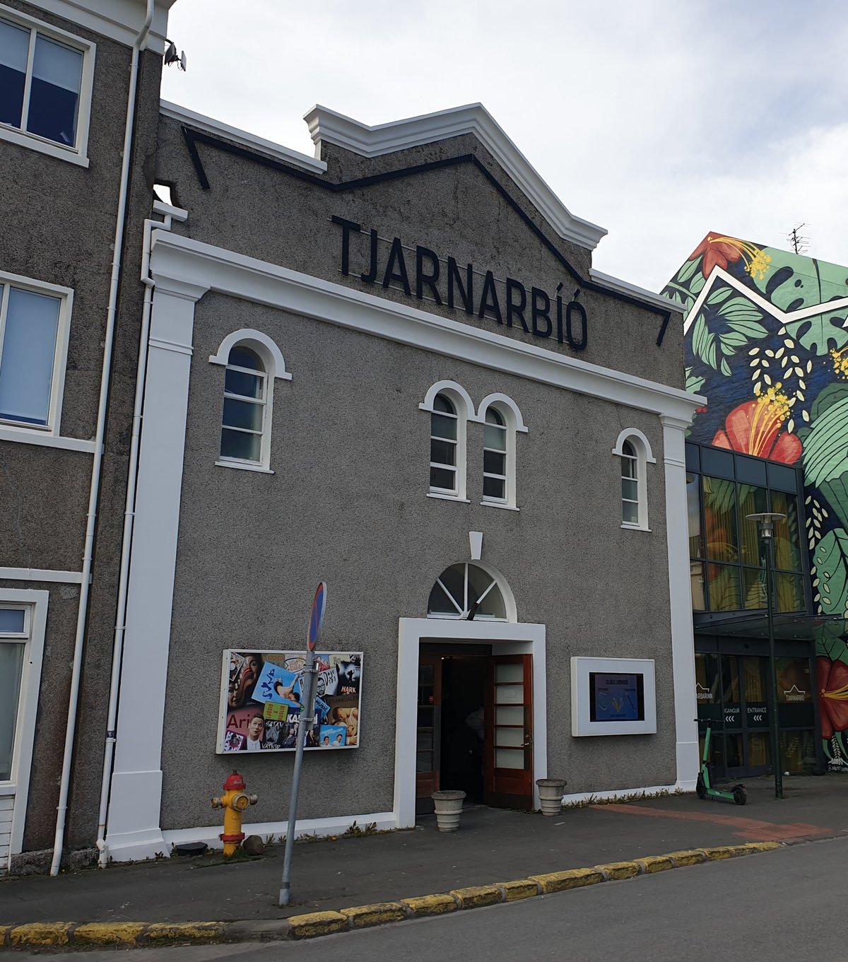 Exterior view of Tjarnarbíó cinema in Reykjavík, Iceland on a cloudy day