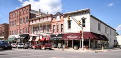 Downtown streetscape in Noblesville, Indiana with historic buildings and clear blue sky