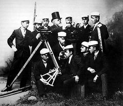 Group of TKK surveying students with professor outdoors