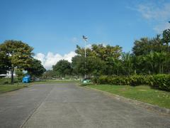 Manila Memorial Park graves with florid landscaping including Ninoy and Cory Aquino tombs in Parañaque City
