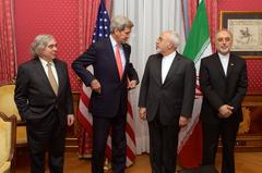 US Secretary of Energy Ernest Moniz, US Secretary of State John Kerry, Iranian Foreign Minister Mohammad Javad Zarif, and Ali Akbar Salehi at Beau-Rivage Palace bilateral nuclear talks in Lausanne 2015