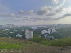 Hill side down view of buildings in a dense area