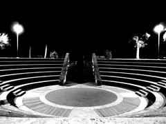 Amphitheater inside Parco Virgiliano in Naples with seating and greenery