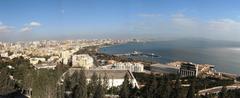 Panoramic view of Baku city skyline with modern skyscrapers and Caspian Sea