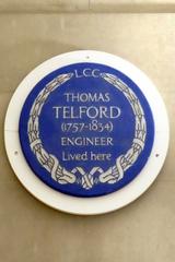 Blue glazed ware plaque dedicated to engineer Thomas Telford at 24 Abingdon Street, Westminster