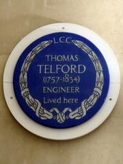Blue glazed ware commemorative plaque for engineer Thomas Telford at 24 Abingdon Street, Westminster