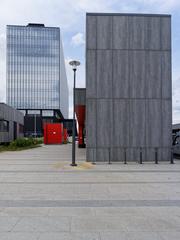 Moscow Mnyovniki metro station surface infrastructure with modern buildings and greenery