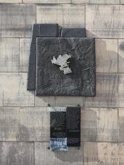 Warsaw Ghetto border monument on the outer wall of the Palace of Culture and Science