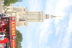 Warsaw cityscape with modern skyscrapers and historic buildings in August