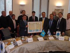 Visitors from Oskman Kazakhstan signing a twin city agreement
