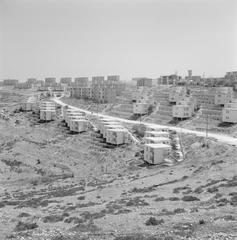 Terraced new residential buildings on a hillside in Nazareth, Galilee, Israel, 1964 black and white photo