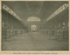 Interior view of Nowa Warszawa market halls in Warsaw with architectural details and lighting