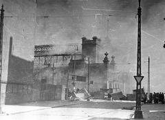 Hala Mirowska on fire during the Warsaw Uprising as seen from Solna Street, now known as John Paul II Avenue