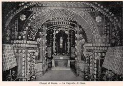 Interior view of the Chapel of Bones in Malta featuring walls decorated with human bones