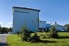 Tromsø Museum building with modern architectural design surrounded by greenery