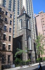 Former St Ann's Church now entry hall for dormitory viewed from 12th Street on a sunny morning
