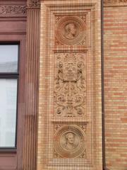 Facade medallions at Hamburger Kunsthalle showcasing classical portraits in Hamburg, Germany
