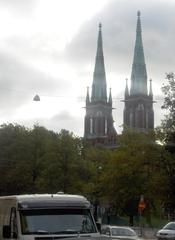 Towers of St. John's Church in Helsinki under a blue sky