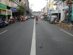 Busy intersection of Arnaiz Avenue with Libertad Road and Pasay Road in Pasay City featuring various streets and landmarks