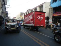 View of Arnaiz Avenue, Libertad Road, and Pasay Road intersection in Pasay City featuring Holy Trinity Parish Church and Victory Pasay Mall