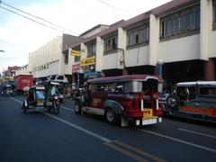 Arnaiz Avenue at Libertad Road and Pasay Road intersection in Pasay City showing roads, buildings, and urban landscape