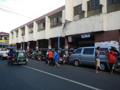 Arnaiz Avenue at Libertad Road and Pasay Road junction in Pasay City with Holy Trinity Parish Church and Victory Pasay Mall visible