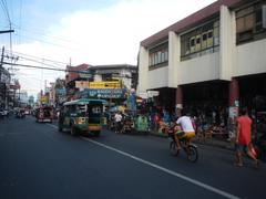 Arnaiz Avenue Libertad Road and Pasay Road intersection with Holy Trinity Parish Church and Victory Pasay Mall in Pasay City Philippines